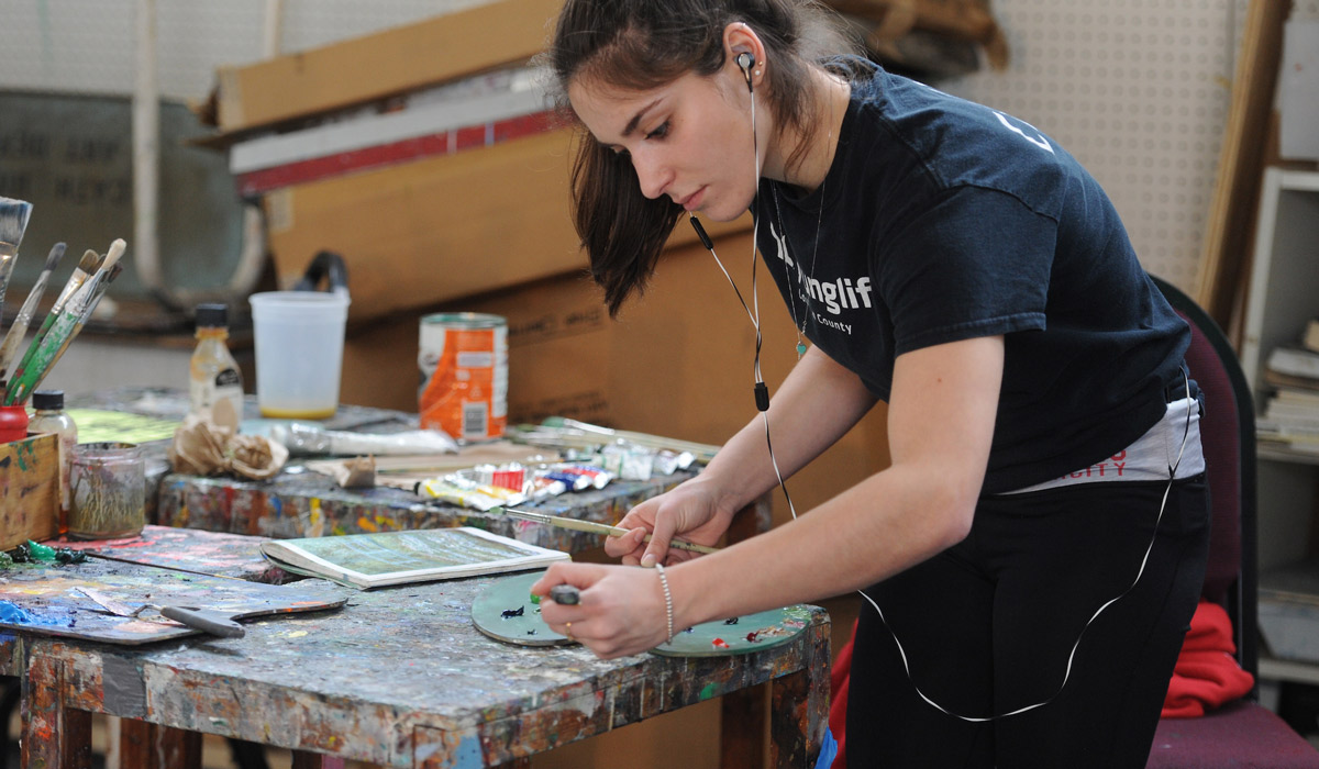 Student working in painting studio