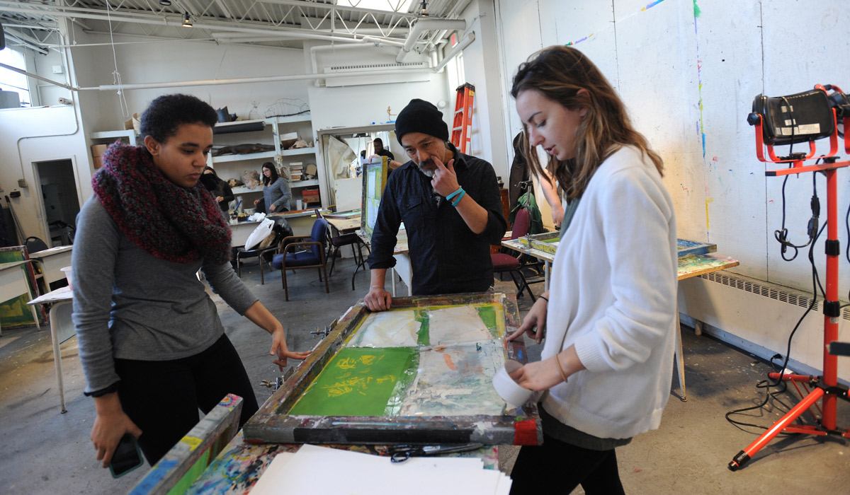 Students working in printmaking studio